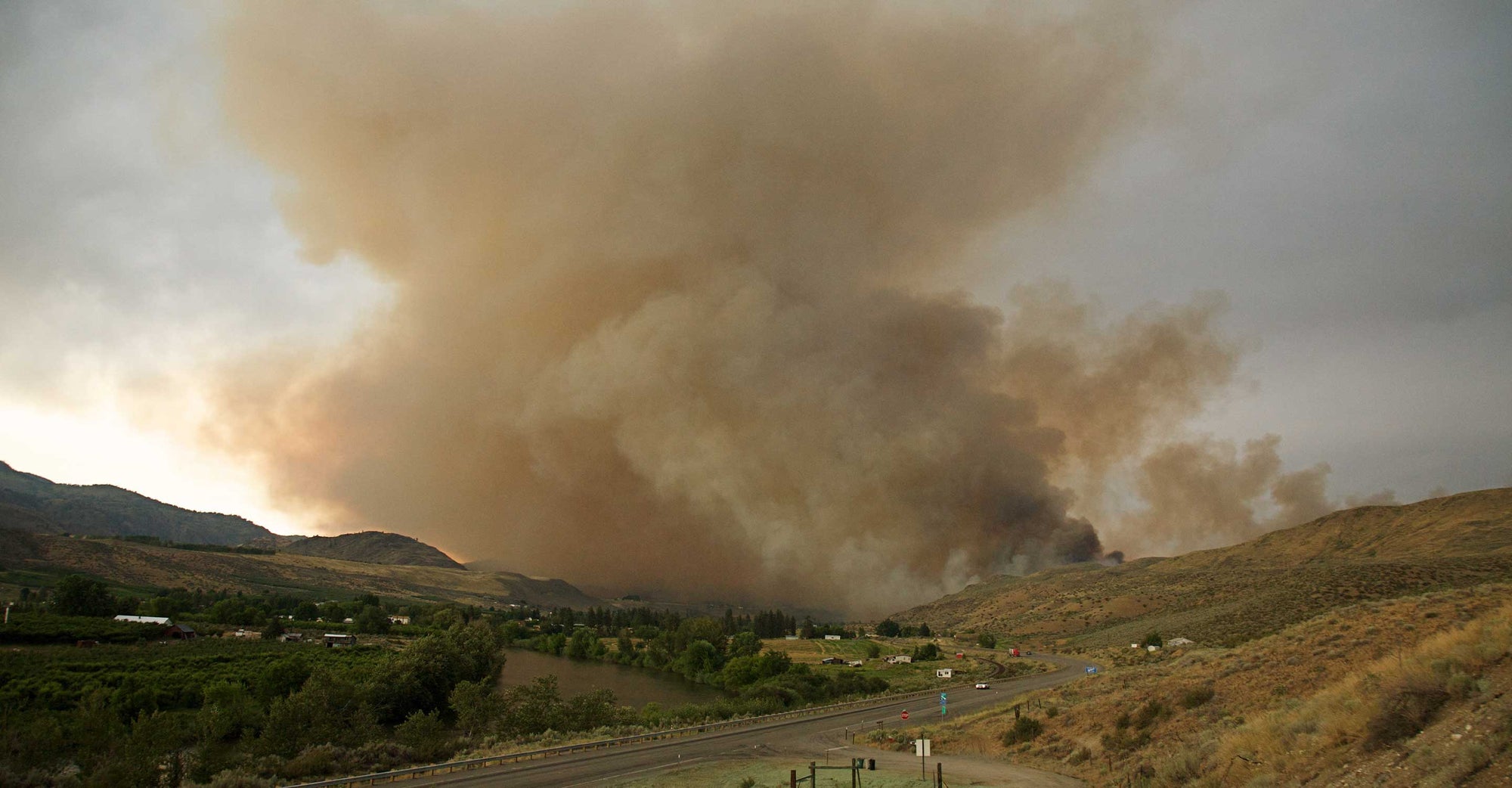 Wildfire smoke over hill