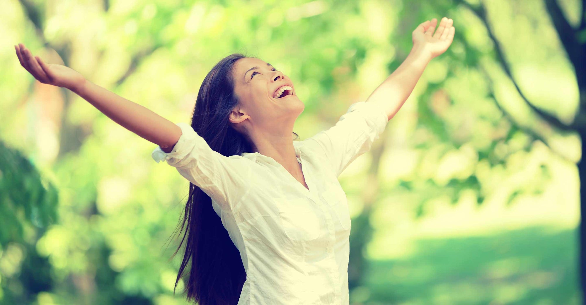 woman spreading her in air with joy