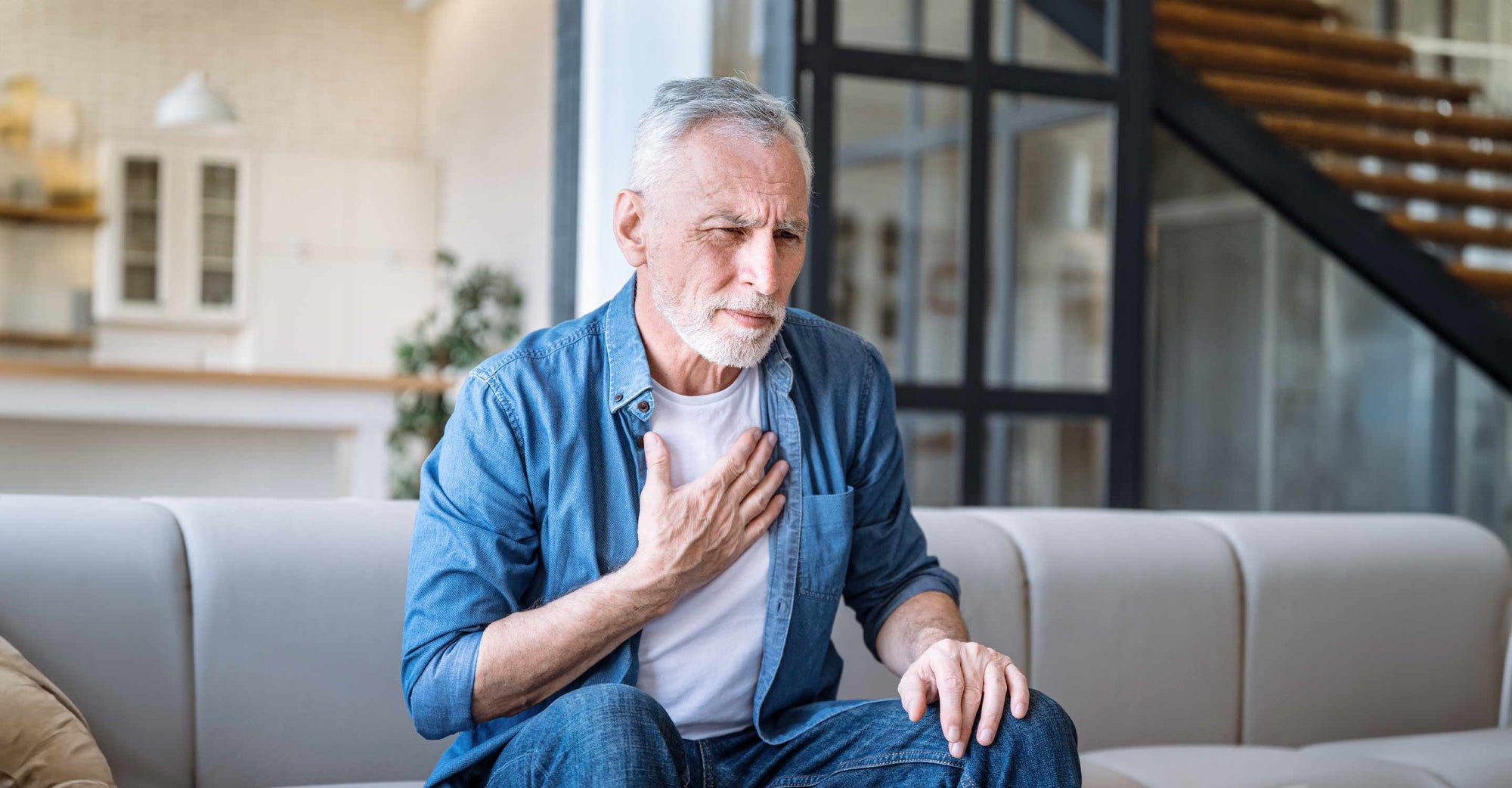 old man suffering from allergy