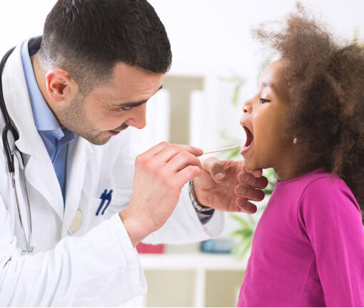 Doctor checking on child