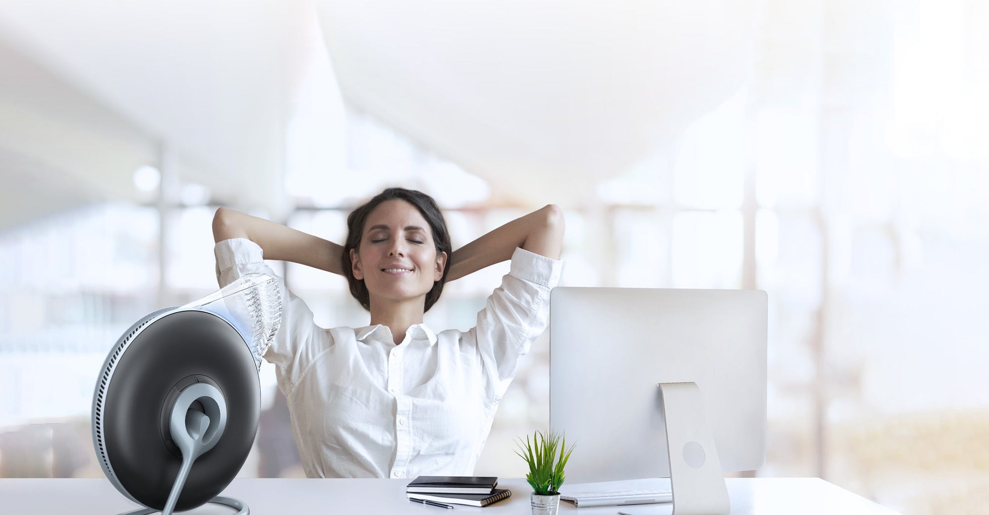 woman stretching next to Atem Desk black