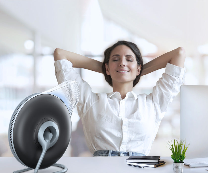 woman stretching next to Atem Desk black