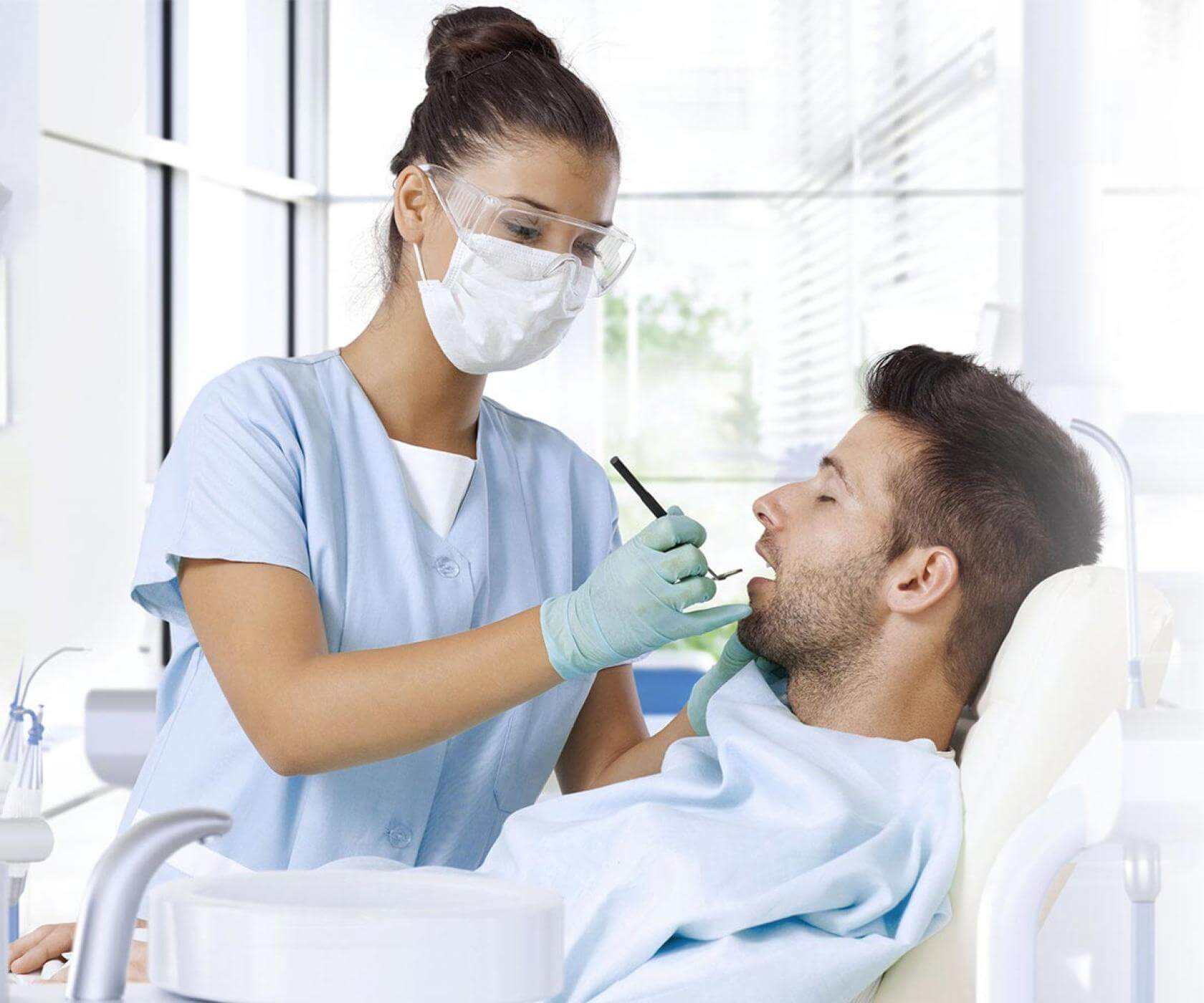 Dentist working on patient