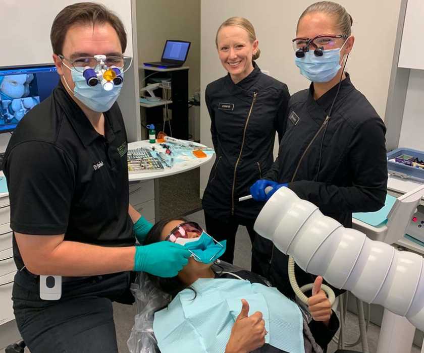 Dentists working on patient