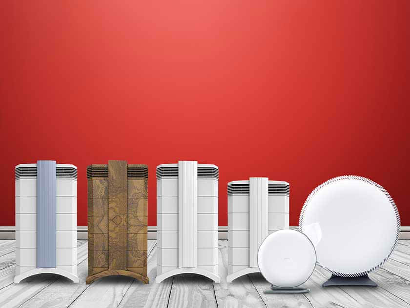 IQAir Purifiers behind red background